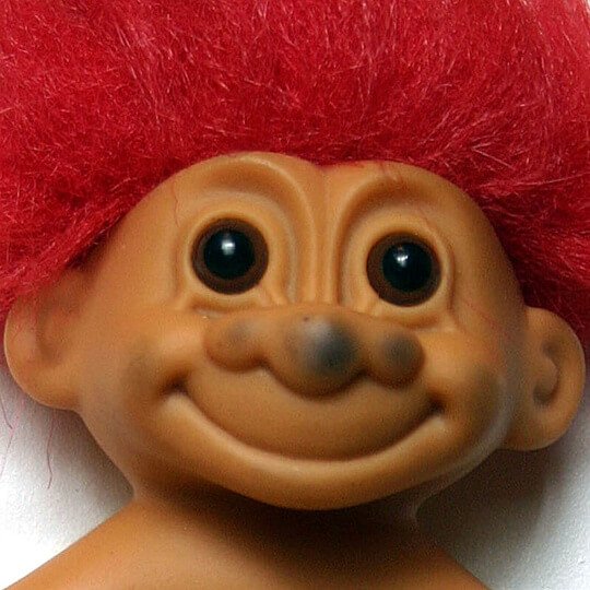 Toy troll with a dirty face